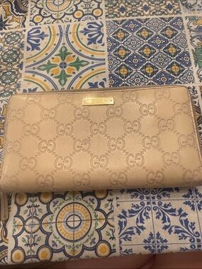 Authentic Gucci Guccissima Ivory Leather Zip Around Wallet